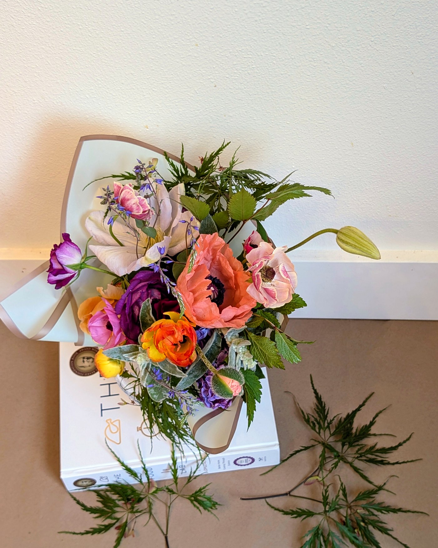 Recital bouquet — colorful hand-tied bouquet with poppies, ranunculus, and anemones